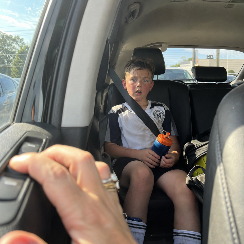 Child in car after school